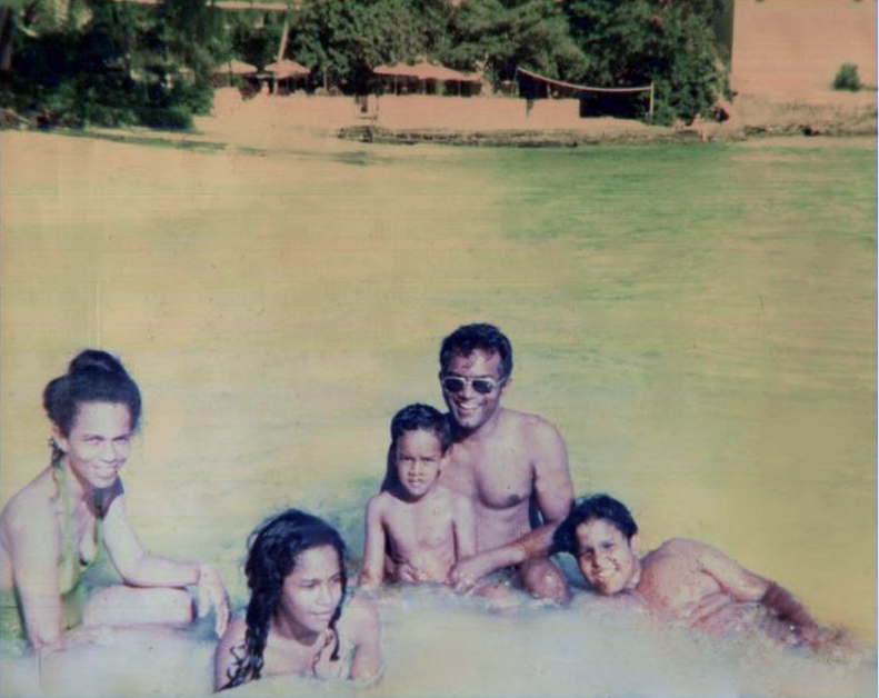 Maria with members of her family in the sea at Rockley, Barbados, in the early 1980s